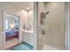 Bright bathroom boasts a large shower, vanity with storage, and linen closet at 8382 Camp Gregg Ln, North Charleston, SC 29418