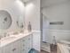 Double vanity bathroom with a walk-in shower and soaking tub at 8382 Camp Gregg Ln, North Charleston, SC 29418