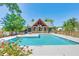 Inviting community pool with surrounding patio furniture at 8382 Camp Gregg Ln, North Charleston, SC 29418
