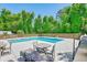 Relaxing community pool area with lounge chairs at 8382 Camp Gregg Ln, North Charleston, SC 29418