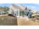 Backyard with sunroom and grill at 8646 Grassy Oak Trl, North Charleston, SC 29420