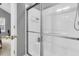 Clean bathroom with a shower/tub combo and gray walls at 8646 Grassy Oak Trl, North Charleston, SC 29420