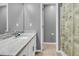 Bathroom with granite countertop and white cabinets at 8646 Grassy Oak Trl, North Charleston, SC 29420