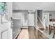 Bright and spacious entryway with hardwood floors and staircase at 8646 Grassy Oak Trl, North Charleston, SC 29420