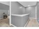 Upper hallway with gray walls and carpet at 8646 Grassy Oak Trl, North Charleston, SC 29420