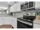 Modern kitchen with stainless steel appliances and granite countertops at 8646 Grassy Oak Trl, North Charleston, SC 29420