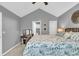 Spacious main bedroom with a large bed, ensuite bathroom, and ample closet space at 8646 Grassy Oak Trl, North Charleston, SC 29420