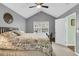Large bedroom with high ceiling, carpeted floor, and plenty of natural light at 8646 Grassy Oak Trl, North Charleston, SC 29420