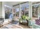 Sunroom with plenty of natural light and plants at 8646 Grassy Oak Trl, North Charleston, SC 29420