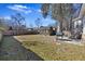 Large backyard with shed, grill, and wooden fence at 9609 Crosscut Dr, Ladson, SC 29456
