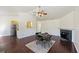 Casual dining area with hardwood floors and a fireplace at 9609 Crosscut Dr, Ladson, SC 29456
