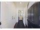 Bright entryway with dark front door and access to multiple rooms at 9609 Crosscut Dr, Ladson, SC 29456