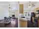 Kitchen features granite countertops and wooden cabinets at 9609 Crosscut Dr, Ladson, SC 29456