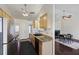 Kitchen boasts granite countertops and wood cabinets at 9609 Crosscut Dr, Ladson, SC 29456