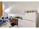 Small kitchen with white appliances and wood cabinets at 9609 Crosscut Dr, Ladson, SC 29456