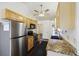Kitchen with granite countertops and stainless steel fridge at 9609 Crosscut Dr, Ladson, SC 29456