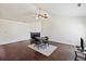Living room with hardwood floors, fireplace, and ceiling fan at 9609 Crosscut Dr, Ladson, SC 29456