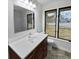 Updated bathroom with a vanity, large mirror, and updated fixtures at 119 Sumners Aly, Summerville, SC 29485