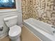 Clean bathroom with a shower/tub combo and updated flooring at 119 Sumners Aly, Summerville, SC 29485