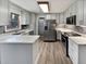 Modern kitchen with gray cabinets and quartz countertops at 119 Sumners Aly, Summerville, SC 29485