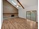 Bright living room featuring hardwood floors and a view of the sunroom at 119 Sumners Aly, Summerville, SC 29485