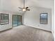 Main bedroom with vaulted ceiling, sliding doors to pool, and carpet at 119 Sumners Aly, Summerville, SC 29485