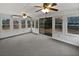 Bright sunroom with multiple windows and carpet flooring at 119 Sumners Aly, Summerville, SC 29485