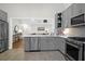 Modern kitchen with gray cabinets and stainless steel appliances at 1234 Chatfield St, Mount Pleasant, SC 29464