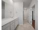 Double vanity bathroom with shower and tile flooring at 137 Claret Cup Way, Charleston, SC 29414
