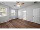 Bright bedroom with wood floors and ensuite bathroom at 137 Claret Cup Way, Charleston, SC 29414