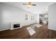 Open concept living room with hardwood floors and kitchen view at 137 Claret Cup Way, Charleston, SC 29414