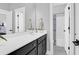 Clean bathroom with dark vanity, white countertop and shower at 1442 Eutaw Battalion Dr, Charleston, SC 29412