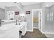 Elegant bathroom with double vanity, large mirror, and walk-in shower at 1442 Eutaw Battalion Dr, Charleston, SC 29412