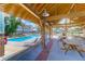 Relaxing community pool with covered seating and picnic tables at 1442 Eutaw Battalion Dr, Charleston, SC 29412