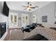 Bright living room with hardwood floors, sectional sofa, fireplace, and access to a deck at 1442 Eutaw Battalion Dr, Charleston, SC 29412