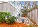 Charming brick patio with seating area and access to stairs at 1442 Eutaw Battalion Dr, Charleston, SC 29412