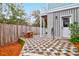 Checkered patio with seating area and exterior access at 1442 Eutaw Battalion Dr, Charleston, SC 29412