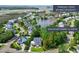 Aerial view of house near tranquil pond at 1504 Rivertowne Country Club Dr, Mount Pleasant, SC 29466