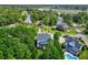 Aerial view of house nestled in trees at 1504 Rivertowne Country Club Dr, Mount Pleasant, SC 29466