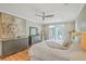 Spacious bedroom with hardwood floors and access to a private deck at 1504 Rivertowne Country Club Dr, Mount Pleasant, SC 29466