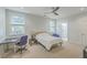 Charming bedroom with built-in workspace and private bathroom access at 1504 Rivertowne Country Club Dr, Mount Pleasant, SC 29466
