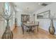 Formal dining room featuring hardwood floors and wainscoting at 1504 Rivertowne Country Club Dr, Mount Pleasant, SC 29466