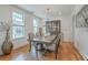 Elegant dining room with hardwood floors and a large table at 1504 Rivertowne Country Club Dr, Mount Pleasant, SC 29466