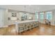 Modern kitchen with white cabinets, large island, and stainless steel appliances at 1504 Rivertowne Country Club Dr, Mount Pleasant, SC 29466