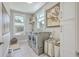 Laundry room with washer, dryer, and ample storage space at 1504 Rivertowne Country Club Dr, Mount Pleasant, SC 29466