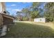 Large backyard with detached shed and mature trees at 1520 Acacia St, Charleston, SC 29407