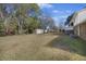 Spacious backyard with detached shed and mature trees at 1520 Acacia St, Charleston, SC 29407