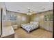 Bedroom with wood floors, ceiling fan and dresser at 1520 Acacia St, Charleston, SC 29407