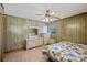 Bedroom with wood floors, ceiling fan and dresser at 1520 Acacia St, Charleston, SC 29407