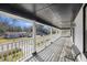 Spacious front porch with white railings and views of the neighborhood at 1520 Acacia St, Charleston, SC 29407